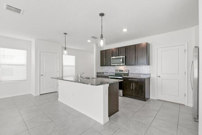 Building Photo - LIKE3 NEW Home For Rent in Avalon Park West!