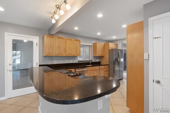 Building Photo - 8408 Louwen Dr