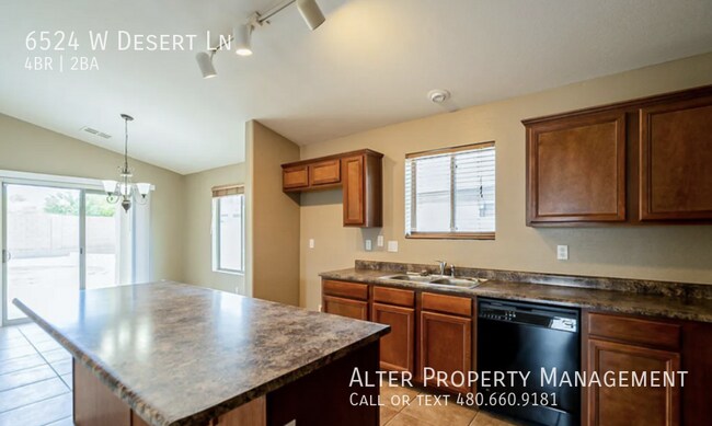 Building Photo - 6524 W Desert Ln