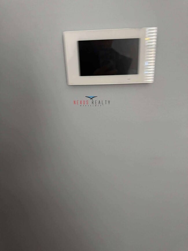 Building Photo - 21-44-44 71st St