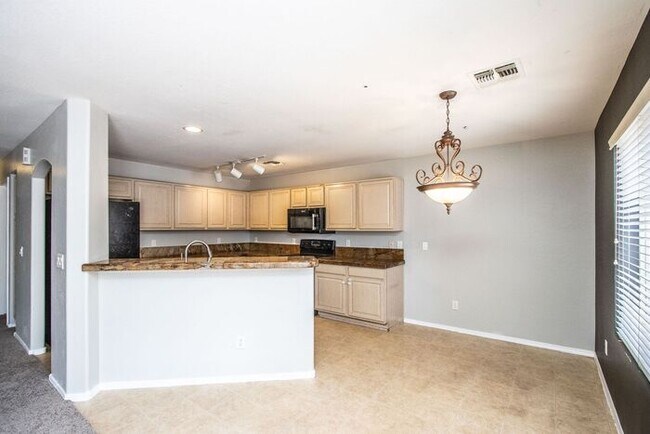 Building Photo - Welcome to this beautiful 4 bedroom, 3 bathroom home in San Tan Valley, AZ.