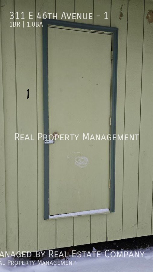 Building Photo - 311 E 46th Ave