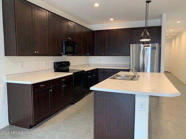 Building Photo - 345 E Caribbean Dr