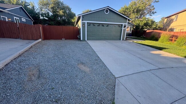 Building Photo - 4bed/2bath/2car garage. RV parking & massive landscaped backyard in cut-de-sac