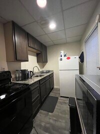 Building Photo - 1709 Tibbits Ave