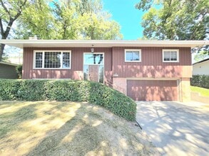 Building Photo - Charming 4-Bedroom Split-Level Home with S...