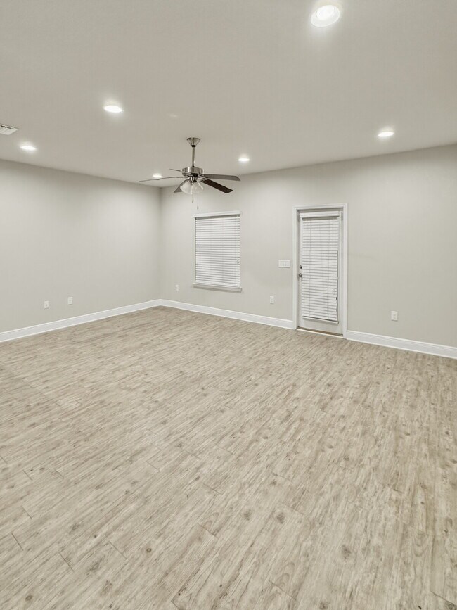 Building Photo - Now Offered at $1,950 – Prime Navarre Location Near Base & Beach