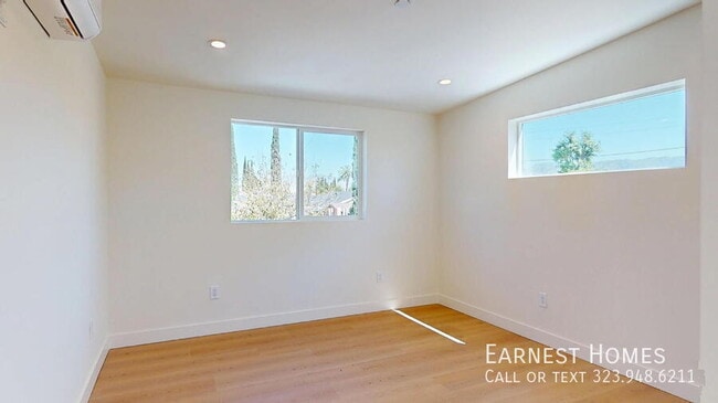 Building Photo - 6445 Satsuma Ave