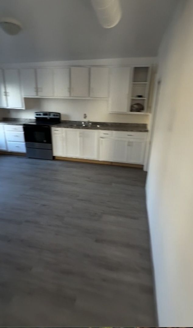 Building Photo - Spacious 7BR Duplex in Manchester