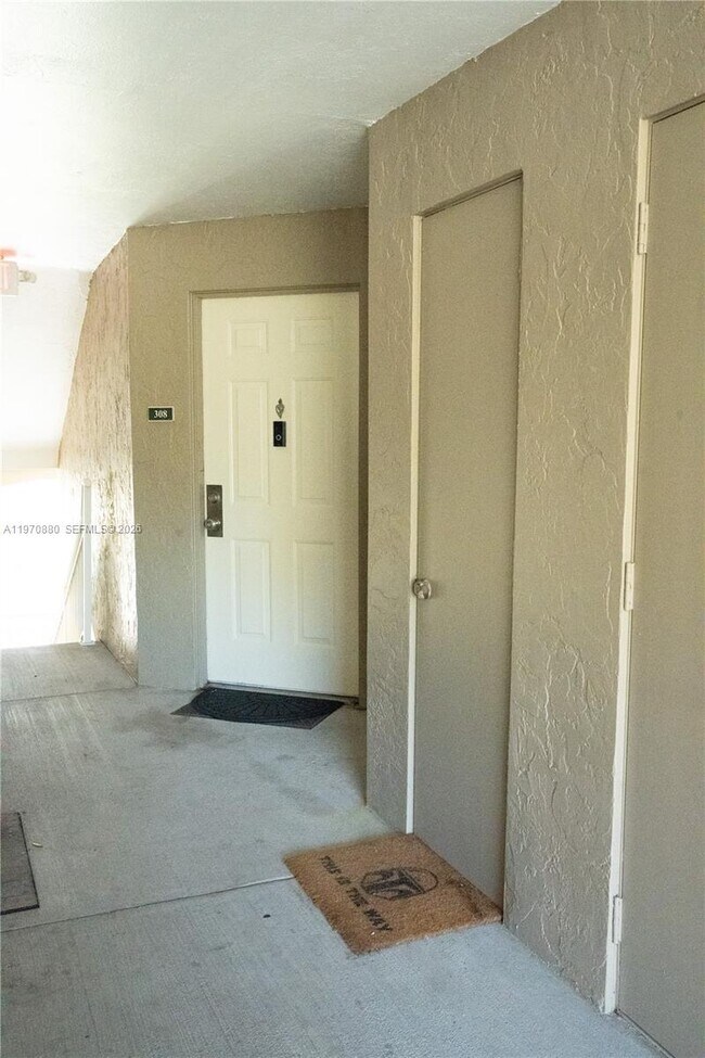 Building Photo - 1865 Palm Cove Blvd