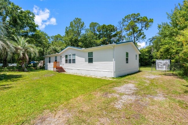 Building Photo - 6847 Woodsman Dr