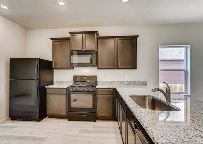 Building Photo - 7376 Blue River Ave