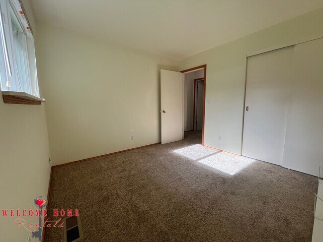 Building Photo - Beautiful Remodeled Rambler!!!  Come enjoy this HUGE backyard!!  NEW CARPET!!