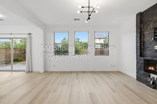 Building Photo - SW!! 2 Story 3 bedroom, 2 car garage!!! All Luxury Vinyl Plank flooring downstairs!!! Water condi...