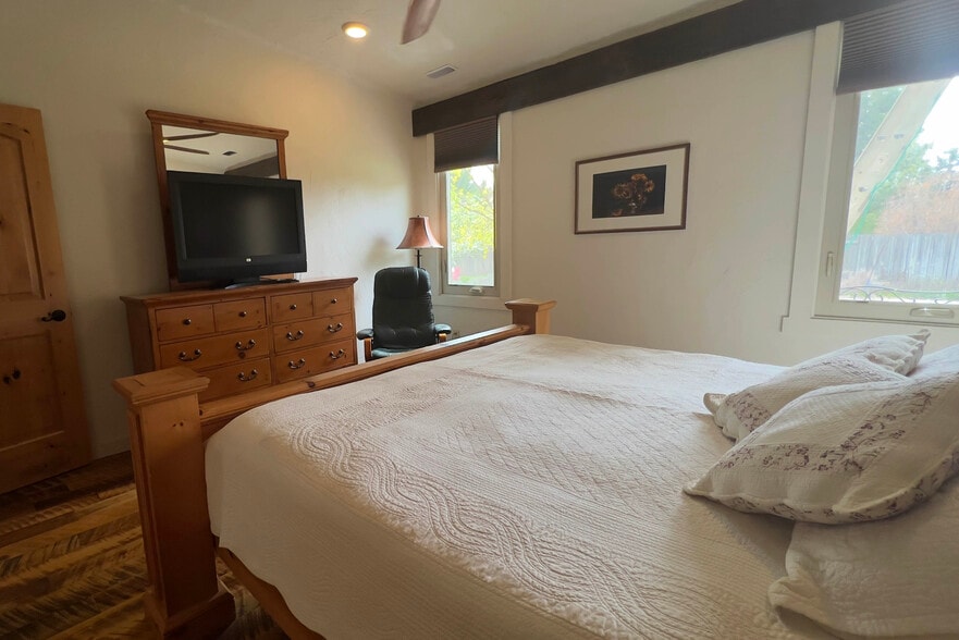 Bedroom. King-sized bed. - 3575 N Brookside Ln