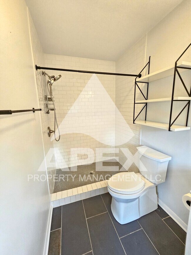 Building Photo - Renovated & Stunning - Single level Brick ...