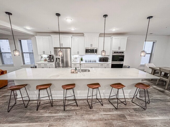 Building Photo - Modern 3 Bed 2.5 Bath End-Unit Townhome With Deck In The Landing At Cannon Branch