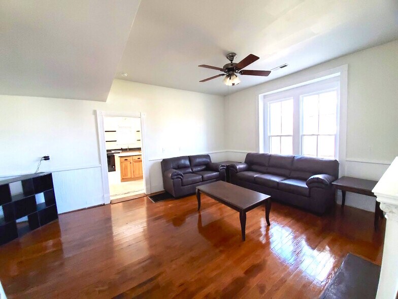 Another furnished room with built in cabinets. Located off the kitchen - 526 Monroe St