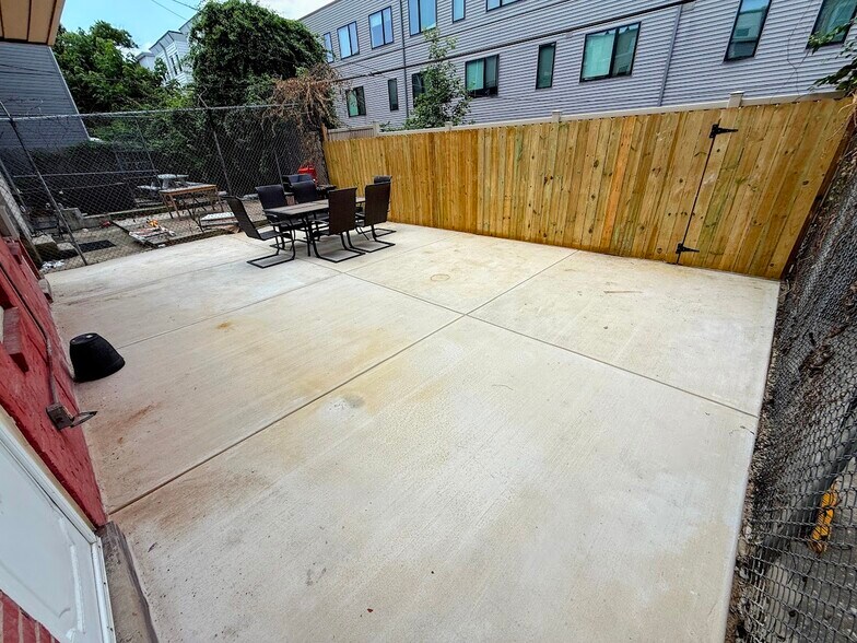 Backyard includes Furniture - 2148 N Carlisle St