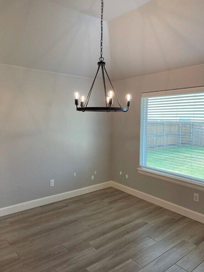 Building Photo - Deer Creek Schools! Storm Shelter, great colors, lots of light, swim, workout and play right in t...