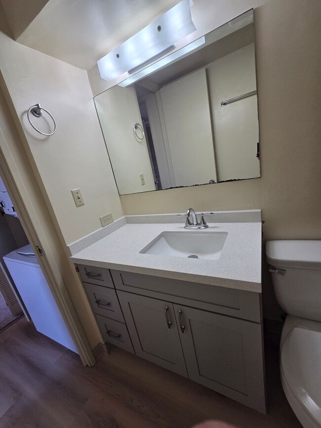 Building Photo - Charming 2 bed, 2 bath, with 1 secured covered parking stall and In-Unit Washer/Dryer. Available Now