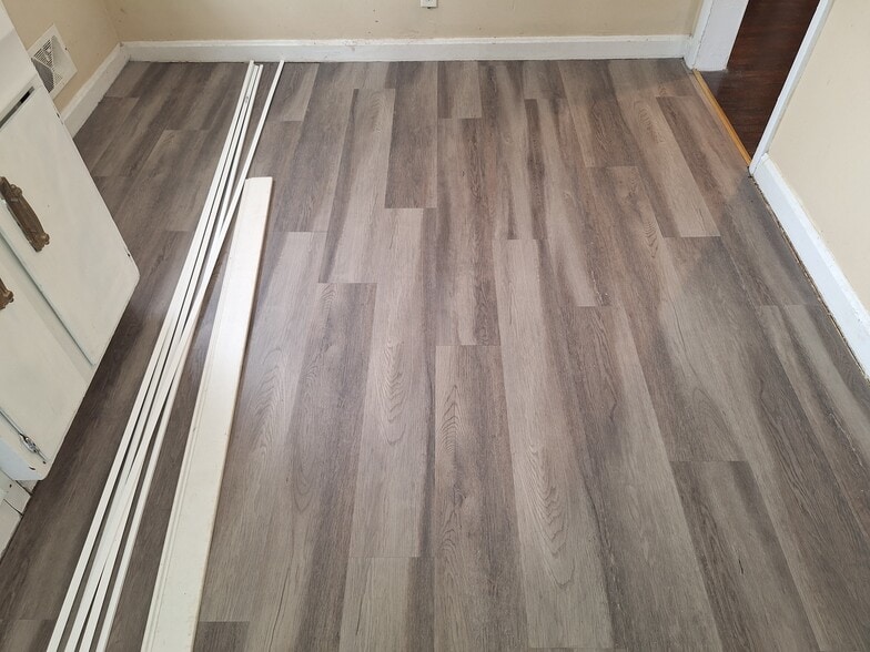 Kitchen floor (new vinyl plank) - 6105 Oakdale Ln