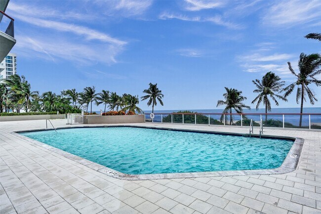 Building Photo - 6767 Collins Ave