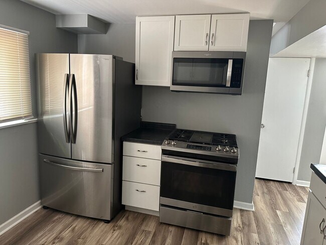 Building Photo - Welcome to our charming home for Rent