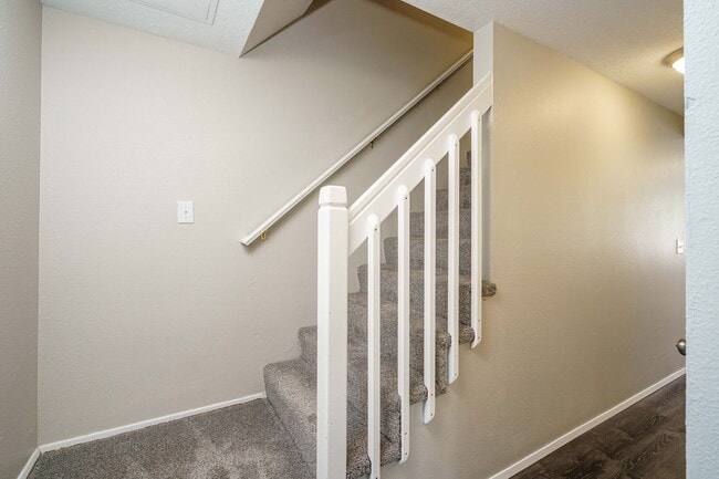 Building Photo - Recently Updated with Wood Laminate Flooring and Fresh Paint