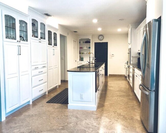 Tons of storage & display cabinets, Stainless sleel appliances, island w/prep sink - 2535 NW 41st St