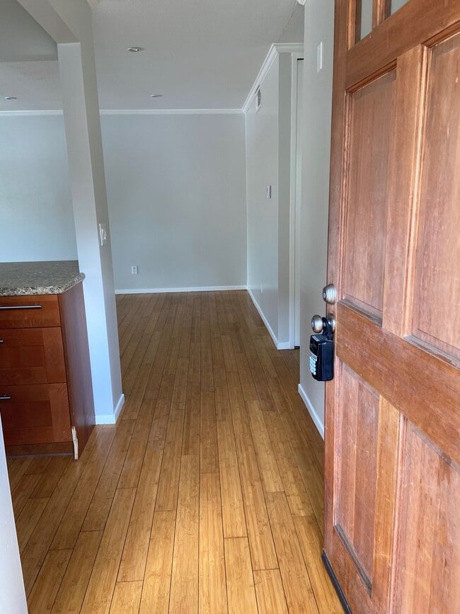 Building Photo - 2 Bed, 1 Bath Townhouse with attached 2 car garage ready to move in soon!!