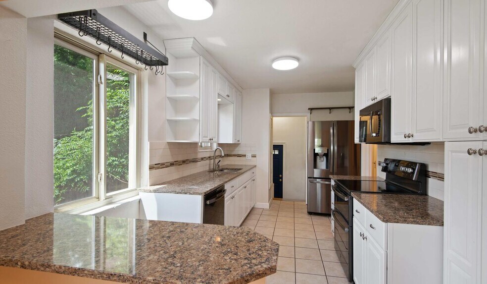Building Photo - Storybook Sloan Lake home with outdoor paradise