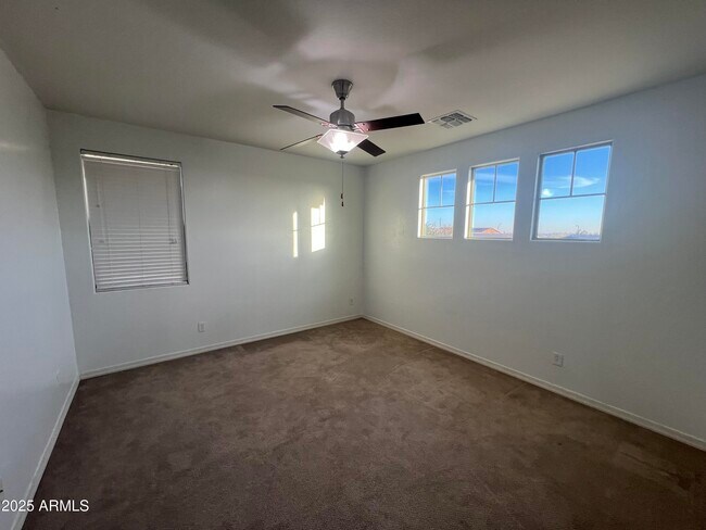 Building Photo - 21284 W Almeria Rd