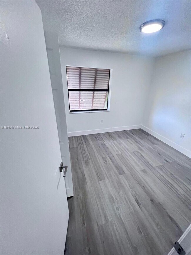 Building Photo - 6866 NW 173rd Dr