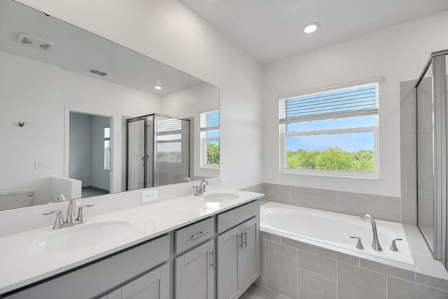 Building Photo - Stunning 4/3 in Gated Dora Parc! Water Views!
