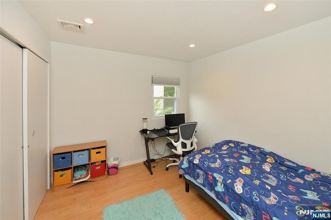 Building Photo - 38-55 van Riper Place Unit 1X