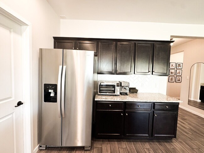 Building Photo - "Spacious 4-Bedroom, 2.5-Bathroom SOLAR Home in Mesa del Sol!"