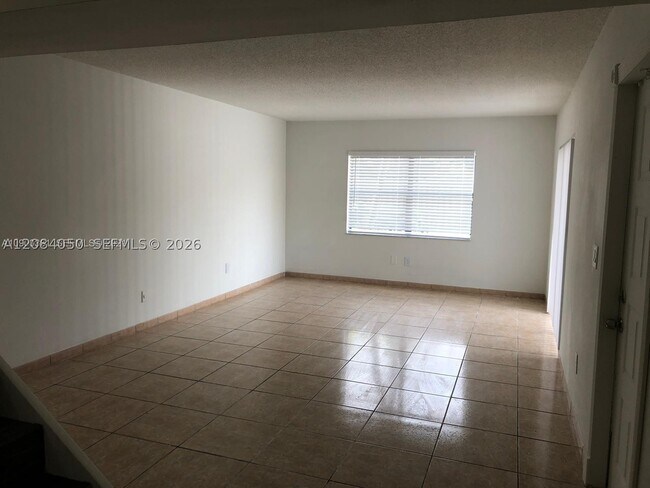 Building Photo - 6575 W 24th Ct
