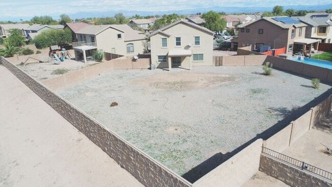 Building Photo - 4BR / 2.5BA Home with Expansive Lot – 2-Car Garage, Community Pools & Golf