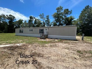 Building Photo - Black Creek Living 2