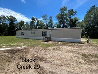 Building Photo - Black Creek Living 2