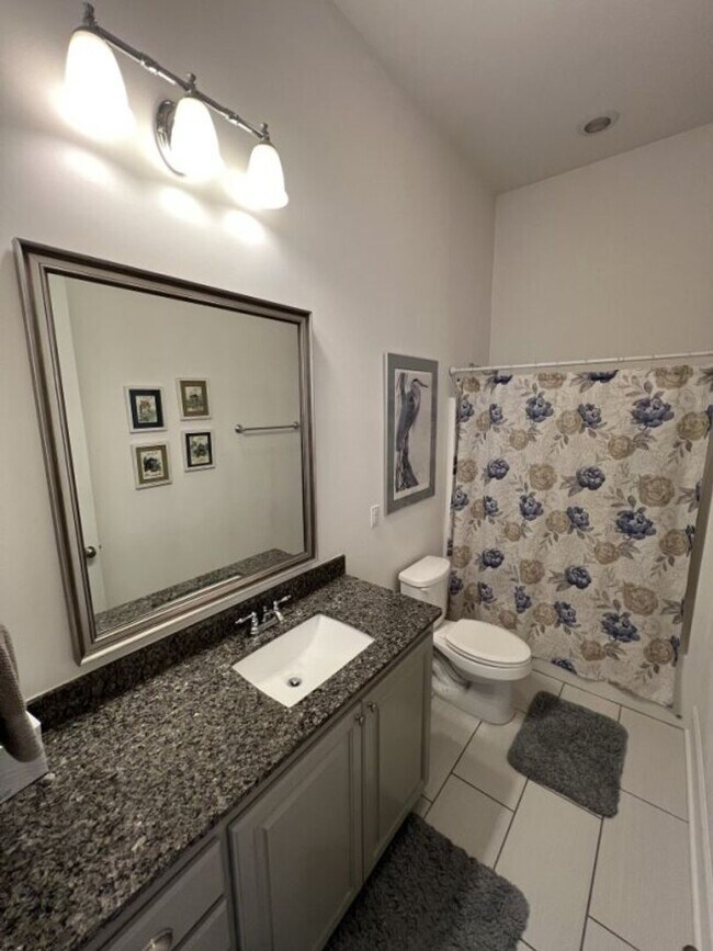 Building Photo - Luxury 4BR Home in Americana | 11 Ft Ceilings, Courtyard Living & Furnished Option