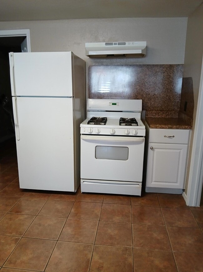 Building Photo - 6113 Ave Q 1/2