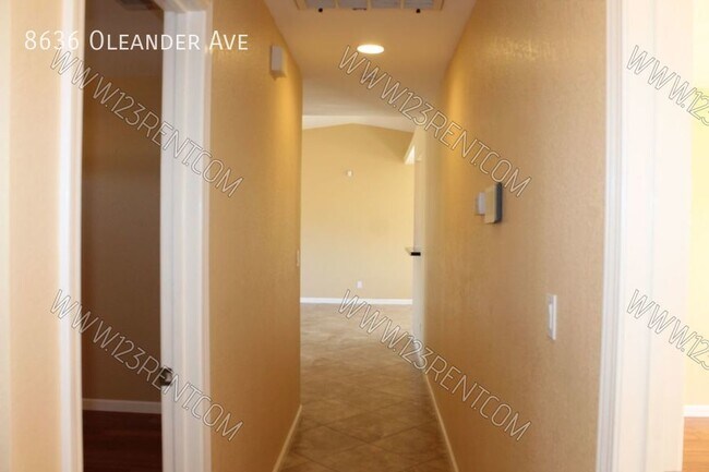 Building Photo - 8636 Oleander Ave