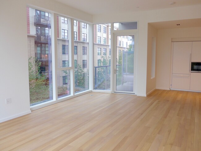 Living room and balcony - 1075 NW Northrup St