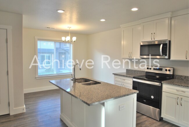 Building Photo - Conveniently Located North Logan Village Townhome | Near Utah State and Hospitals