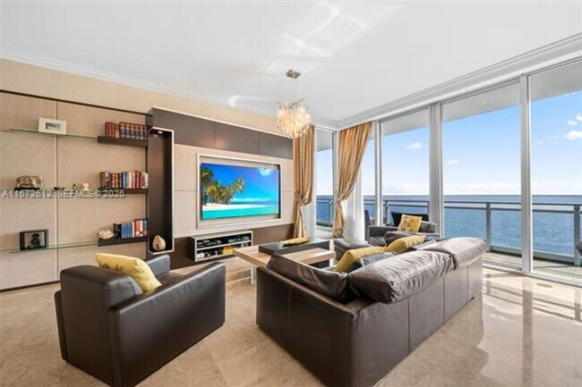 Building Photo - 10295 Collins Ave