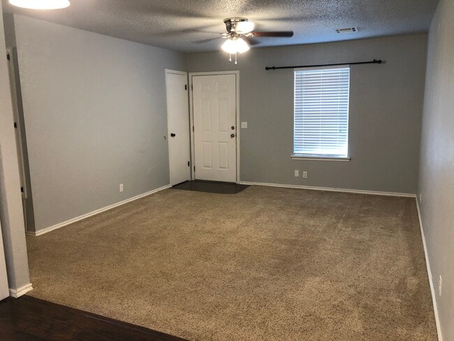 Living Room and Front Door - 254 Hickory Stick Ln