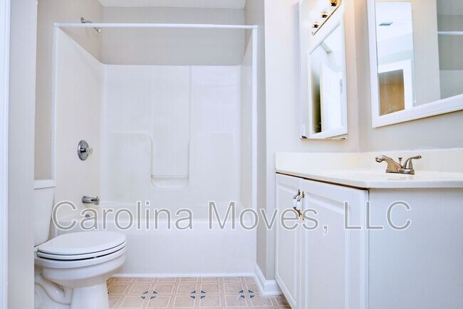 Building Photo - 211 Windsong Dr