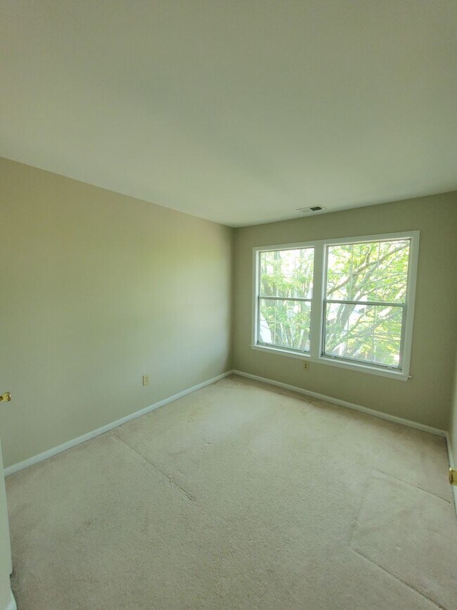 Building Photo - Condominium living at its finest! Updated,...